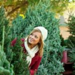 woman at the Christmas tree market